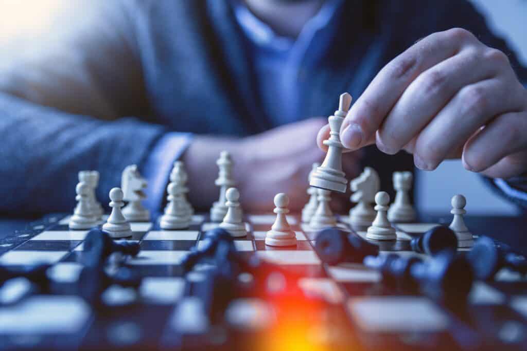 Chess board with the person on the far side making a move