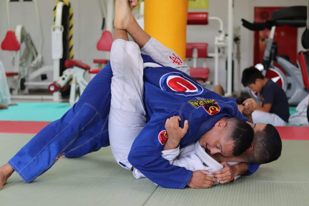 Ju Jitsu Wrestling match - man about to be pined down